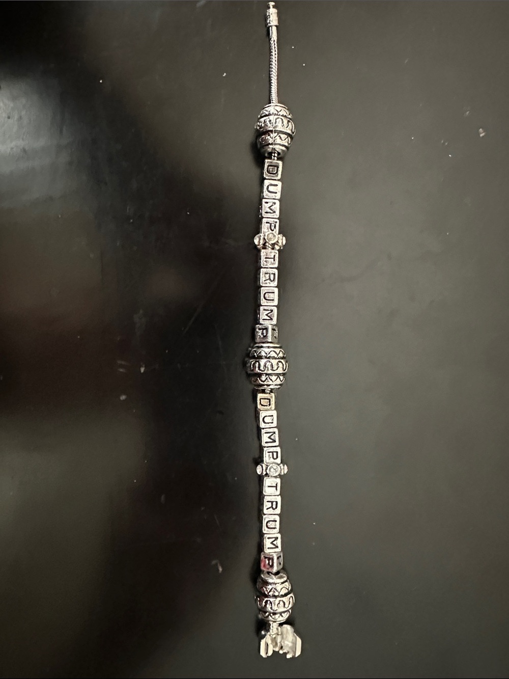 “Dump Trump” Sterling-Tone Letter Bead Bracelet in Silver